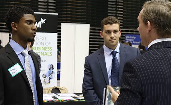 Two students at a career fair